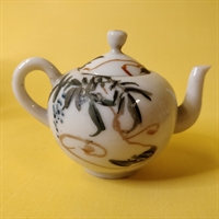 kinesisk dekoreret tepotte dukkeservice